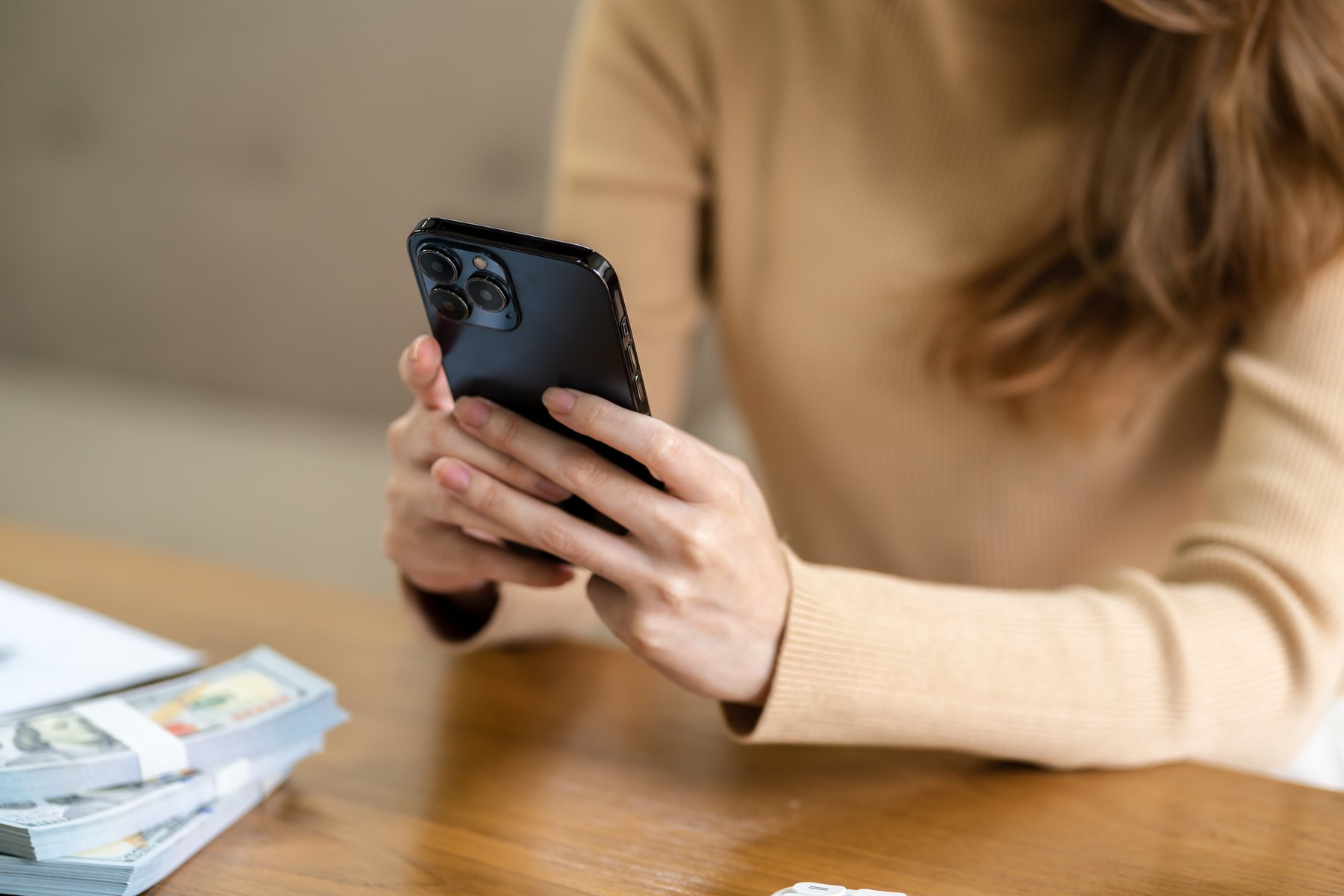 Asian Woman Texting Checking Social Media Holding Smartphone at